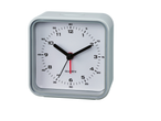 Square alarm clock with white face and grey case.