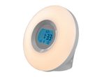 Round wake-up light with a digital clock display showing the time and date
