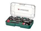 Parkside screwdriver set with various bits in a green and clear case.