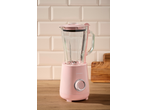 Liquidificador rosa SILVERCREST numa bancada de cozinha de madeira em frente a azulejos bege.
