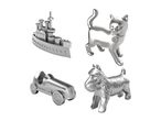 Four silver-colored game tokens: a battleship, a cat, a race car, and a Scottish terrier.