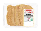 Panierte Maishähnchenschnitzel in einer durchsichtigen Verpackung mit Etikett.