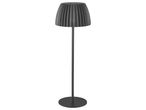 Lampada da terra grigia con paralume a pieghe e base rotonda.