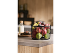 SILVERCREST® Fruit Basket filled with apples, figs, and bananas on a kitchen counter.