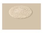 Cream-colored oval shag rug on a beige background.
