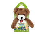A brown teddy bear plush toy holding a green Easter Mix milk chocolate package.