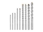 A set of nine masonry drill bits of varying sizes, arranged from smallest to largest.