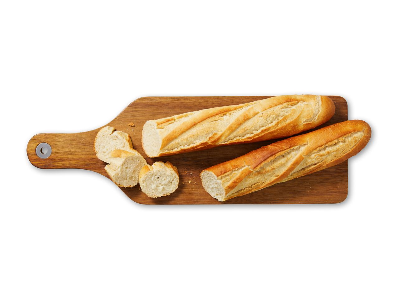 To baguettes, hvoraf den ene er skåret i skiver, på et træskærebræt.