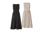 Dvije ženske haljine bez rukava, jedna crna i jedna bež, s elastičnim strukom.