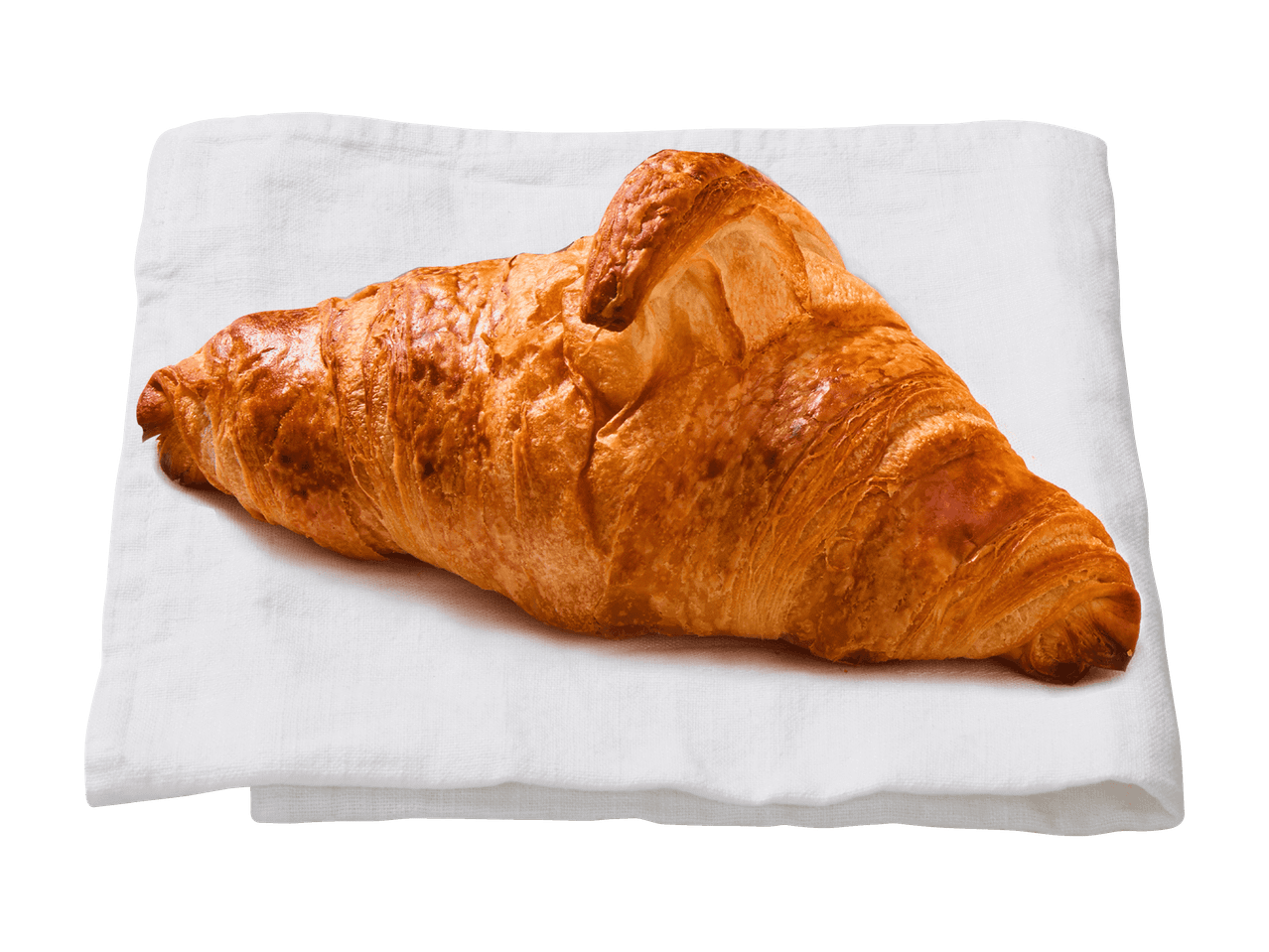 Un croissant doré sur un linge blanc