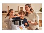 A mother and two children cooking together with a smart kitchen appliance.