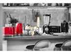 Silvercrest kitchen appliances, including a red toaster, kettle, and blender.