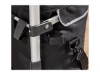 Close-up of a black wheeled shopping bag with a silver aluminum handle.