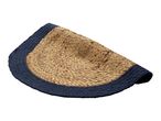 Round jute rug with navy blue border.