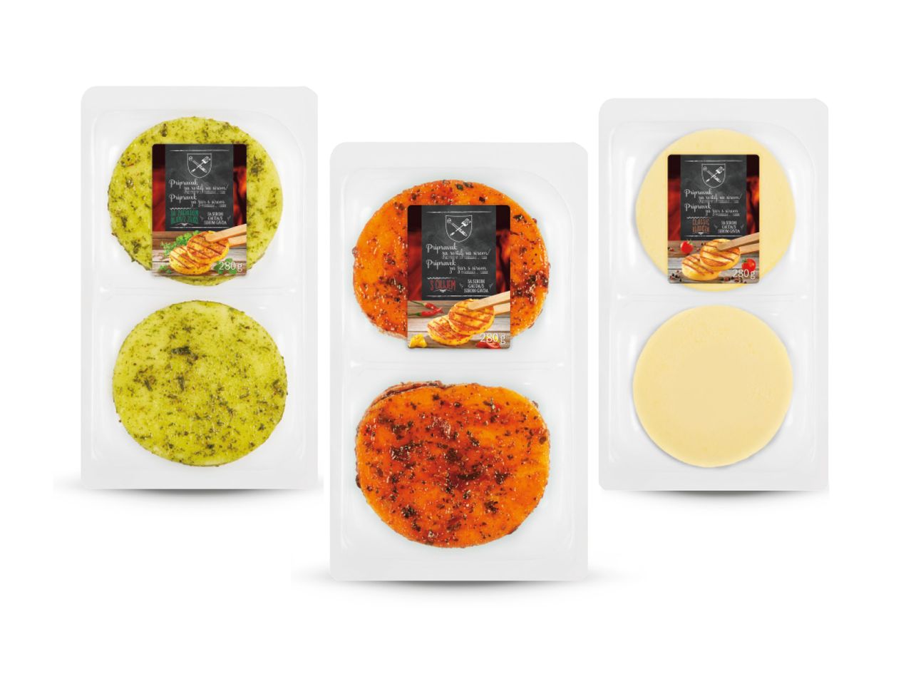 Tri pakiranja gotovih pizza s različitim nadjevima.