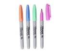 Four pastel Sharpie fine point permanent markers and one cap.