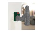 A Parkside cordless drill attached to a wall mount, with a blurred background.
