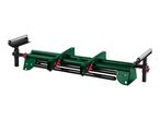 Green and black roller stand with adjustable supports for woodworking or material handling.