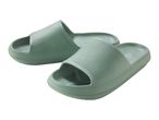 Pair of light green textured slide sandals with thick soles.