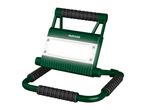 Green and black portable LED work light with a handle and stand