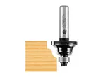 Router bit with a rounded profile, shown next to a piece of wood with the cut profile.