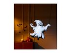 A ghost balloon and Halloween decorations, including bats, spiders, pumpkins, and candles.
