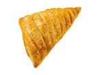 Golden brown, flaky pastry turnover with a triangular shape, isolated on a white background.