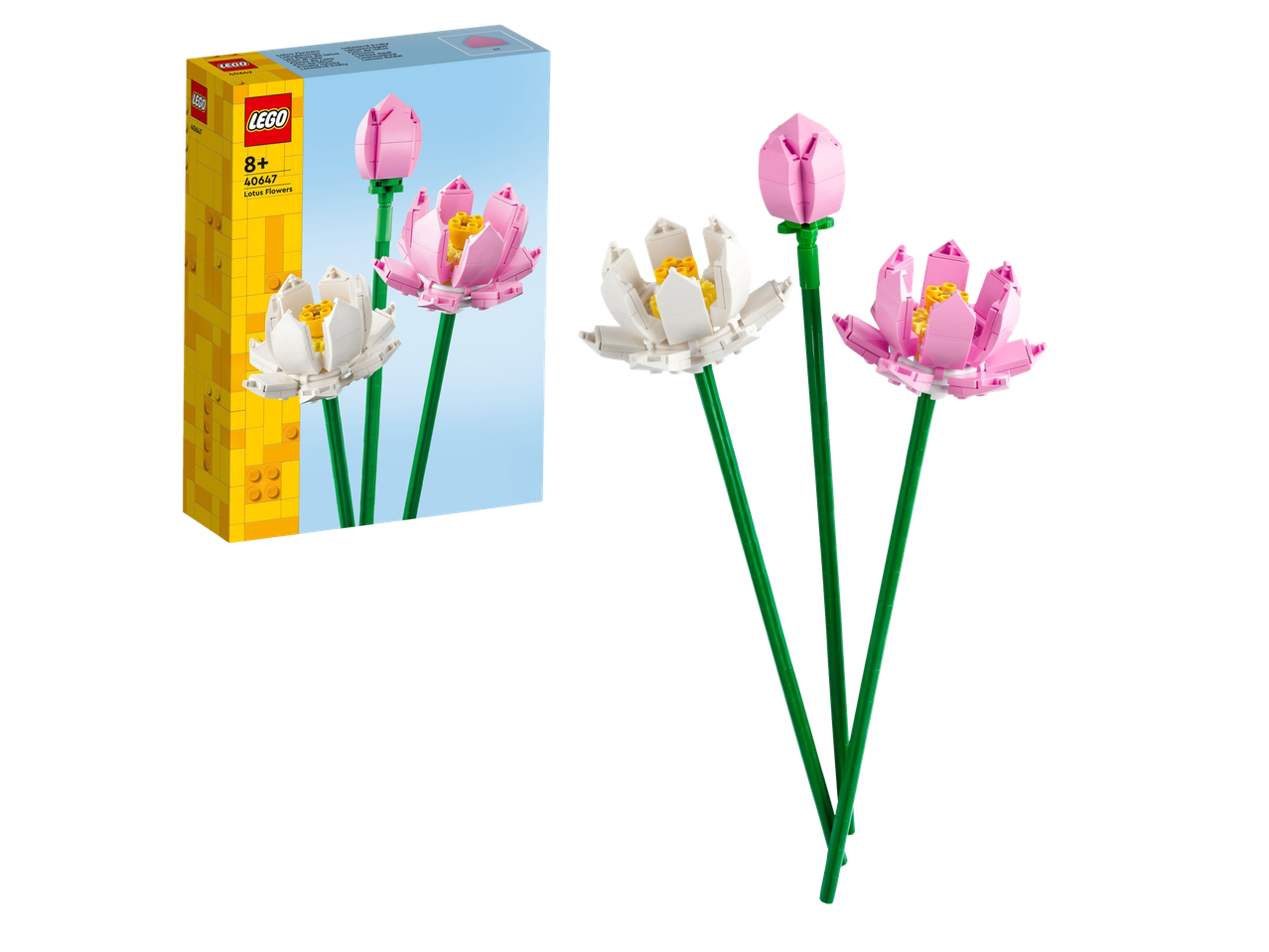 Ružičasti i beli lotosovi cvetovi od kockica, sa pakovanjem u pozadini.