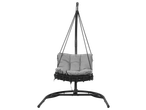 Hanging egg chair with a black frame and grey cushions on a black background.