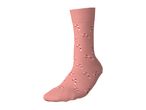 Pink sock with a festive candy cane pattern