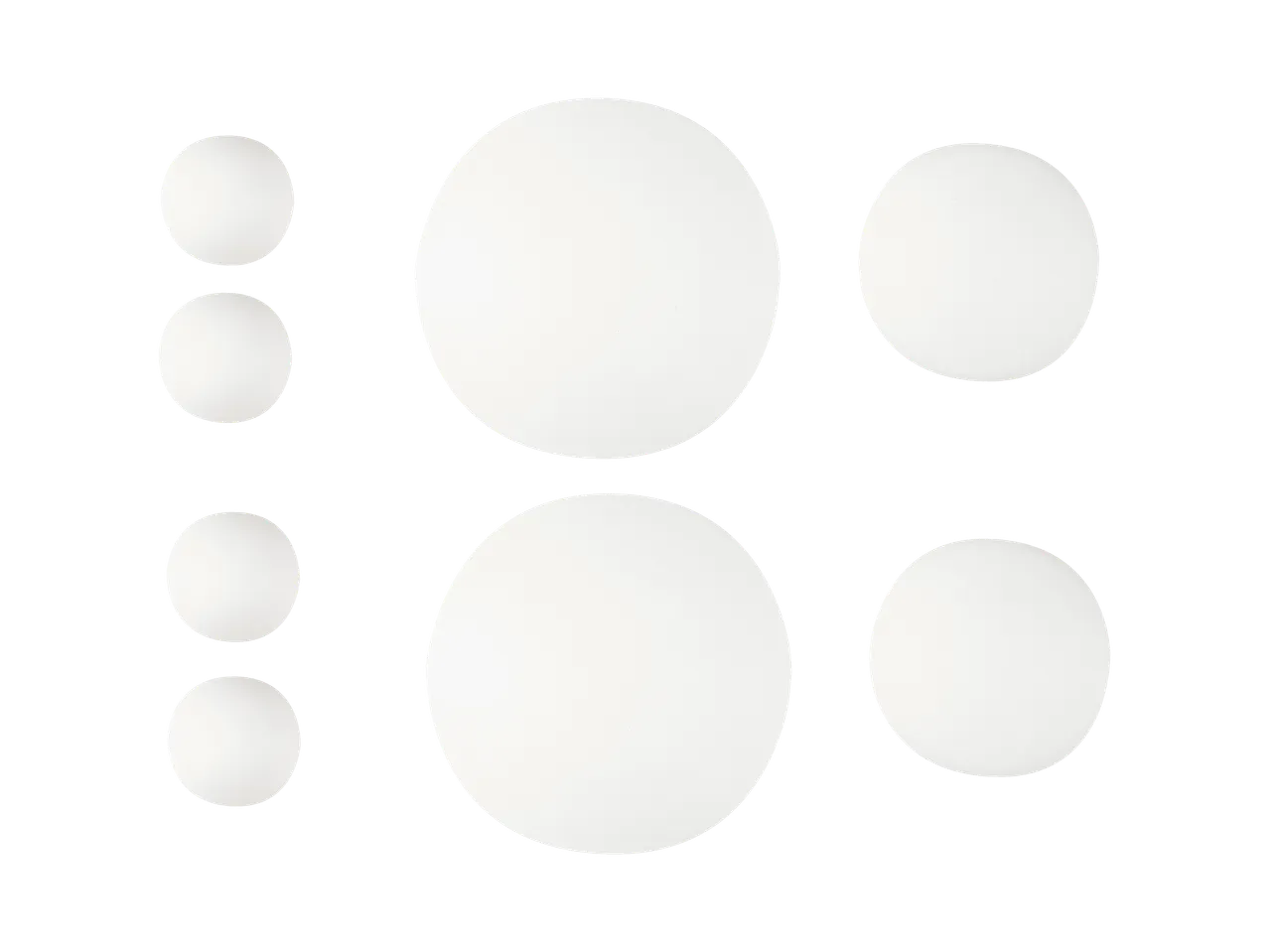 Minimalističen dizajn z belimi krogi na črnem ozadju.