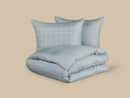 Livarno Microfibre Satin Bedlinen: light blue duvet cover and two pillows with a white grid pattern.