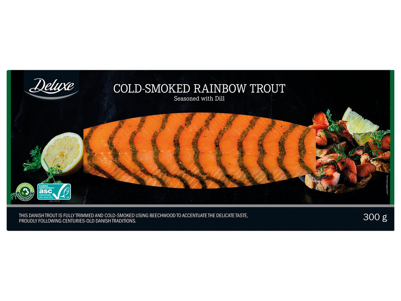 Cold-smoked rainbow trout seasoned with dill, with lemon and a serving suggestion.