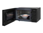Black microwave oven with door open, showing a bowl of soup inside and a digital display set to 12:00.