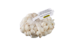 A mesh bag of white onion bulbs with a label indicating origin from The Netherlands.