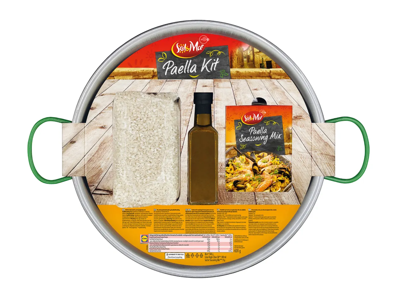 A paella kit with rice, olive oil, and seasoning mix, displayed in a paella pan.