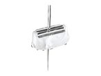 White electric shaver head being rinsed under running water, showing water droplets.