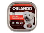 Patê Orlando de carne de vaca para cães, com um cão branco e uma porção de patê.