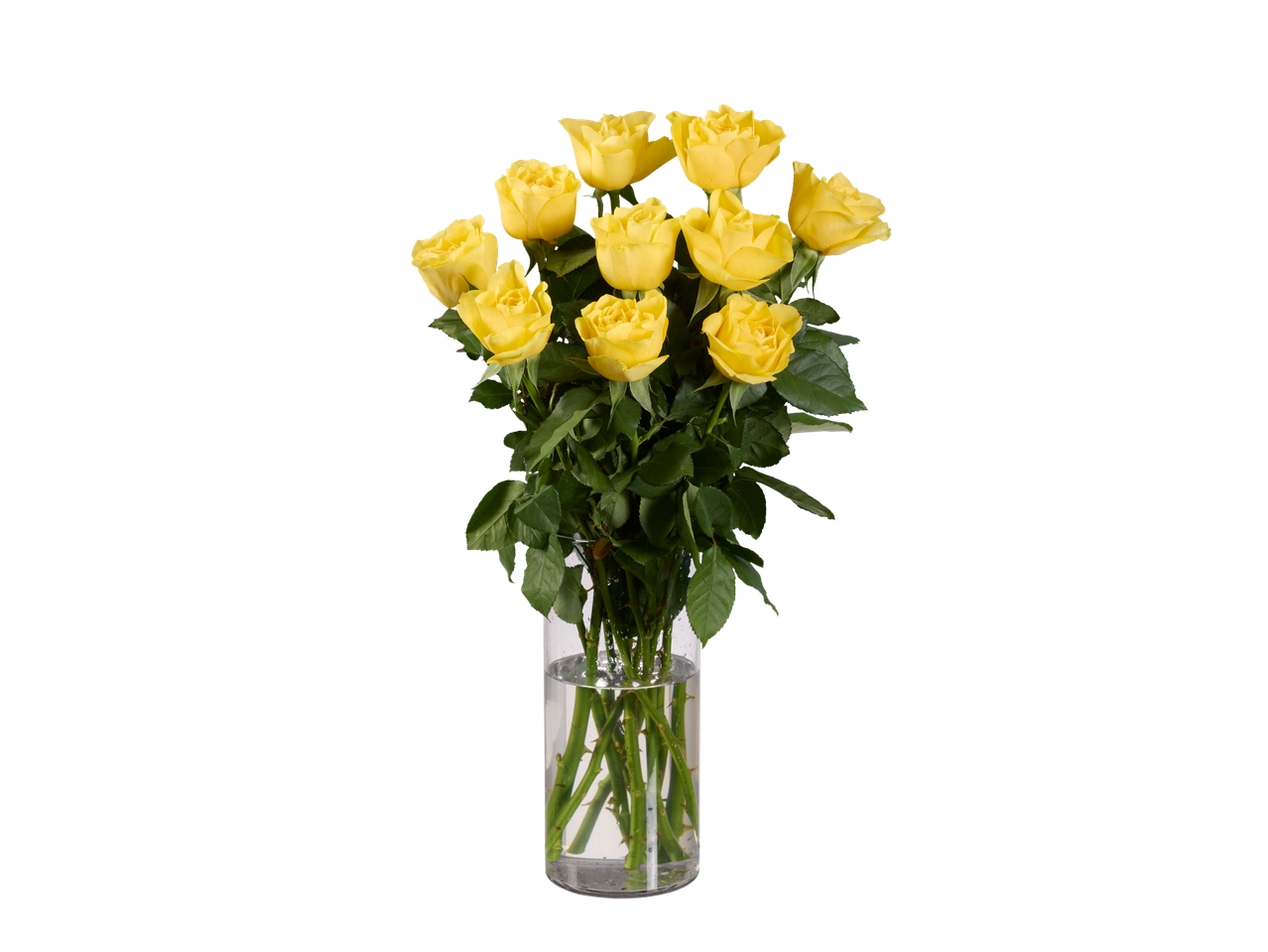 Buchet de trandafiri galbeni într-o vază de sticlă.