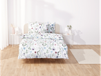 Floral bedding: duvet cover and pillows for a romantic bedroom.