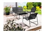 Outdoor lounge set with a two-seater sofa, two armchairs, and a coffee table on a patio.
