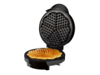 SILVERCREST waffle maker with a heart-shaped waffle inside, open on a black background.