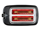 A black two-slice toaster with toasted bread inside.