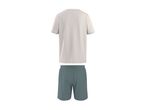 Back view of a light beige t-shirt and dark teal shorts.