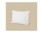 White pillow on a beige background