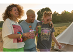 Friends at a festival with glitter and vintage-style shirts.