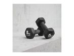 Two black 5kg Crivit dumbbells on a concrete surface.