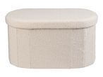 Cream-colored bouclé ottoman with an oval top and cylindrical base.