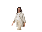 Smiling woman in an esmara® Ladies' Fleece Overshirt and beige trousers.