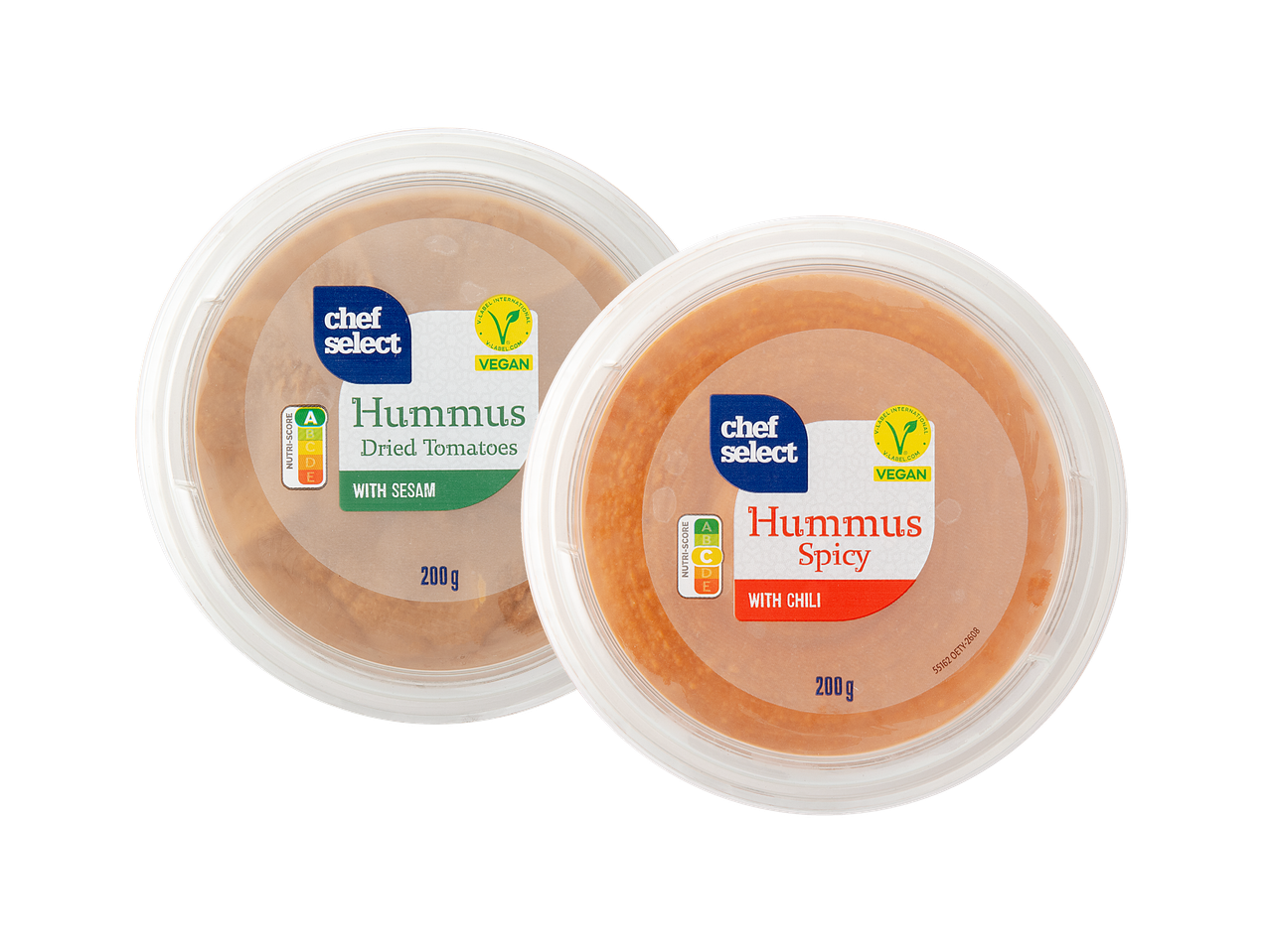 Dva pakiranja humusa: jedan s rajčicama i sezamom, drugi ljuti s čilijem.